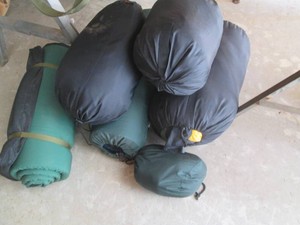 Bundle of sleeping bags and mats