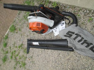 Stihl magnum gas powered BR 800X backpack leaf blower with attachments and accessories shown