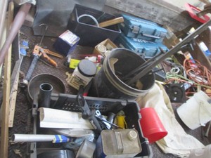 Misc extension cords, automotive tools, pipe bender, metal spikes, ridgid tool crate and much more