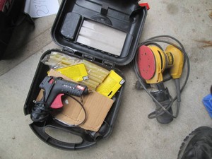 Dewalt orbital palm sander and Hot glue gun with glue in Black and Decker case
