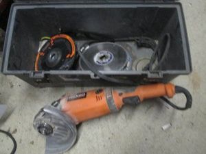 Heavy duty ridgid angle grinder with cutting discs in plastic toolbox