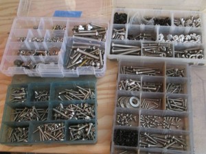 Hardware organizers containing assorted fasteners and hardware