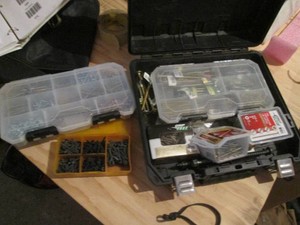 Dewalt hardside case containing hardware organizers and a wide variety of screws