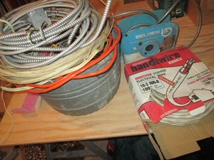 Metal wash bucket full of copper electrical wire