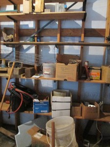 Large variety of power cords and misc electrical supplies, garden fencing and other items shown