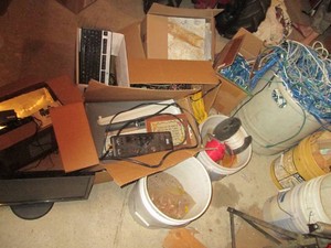 Huge bundle of cable wire, metal platesheet sections, shelf brackets and other misc shown