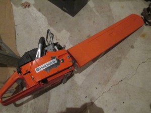 Husqvarna chainsaw with blade and blade cover