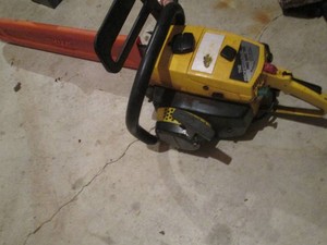 McCullough Pro Mac 700 chainsaw with blade and blade cover