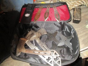 Smith and Wesson throwing Hatchett, throwing knives and stars in soft side zip Milwaukee case