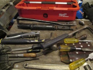 Milwaukee Packout top handle tray full of assorted hand tools and accessories