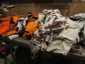 Bulk lot of blaze orange and winter white hunting clothes and accessories