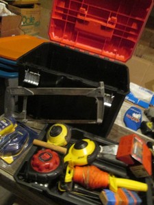 Craftsman toolbox full of measuring instruments and related tools