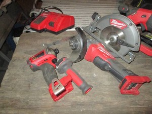 Milwaukee fuel m18 circular saw, Milwaukee m18 angle grinder, Milwaukee 14in hex impact and dual m12m18 charger