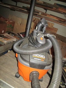 Ridgid Portable shop vac with hose and accessories