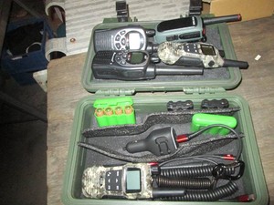 Set of walkie talkies in hardside case