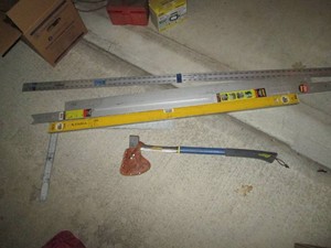 Stabia level, 4ft framing squares and 6ft metal measuring stick