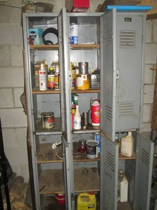 6-space locker unit with content including automotive fluids, outdoor chemicals and household chemicals approx 3ft wide 7ft tall