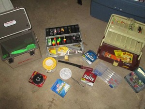 Large lot of fishing supplies, lures, tackleboxes and other gear and equipment