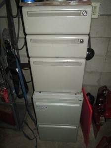 Pair of file cabinets plus content of misc supplies