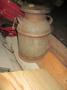 Vintage metal milk can with lid