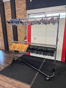 Rolling Garment Rack With Assorted Hangers