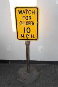 Metal Street Sign with Antique Stand