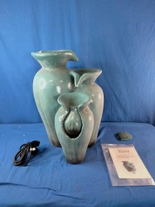 Alpine Corporation 21-inch Tall Turquoise Fountain Pot, a 3-tier cascading water feature.