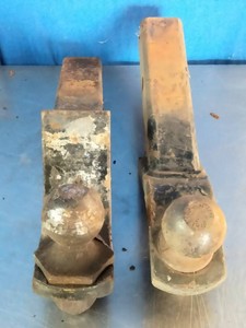 Two used steel trailer hitch ball mounts