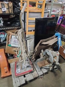Pallet loaded with a variety of household and workshop items