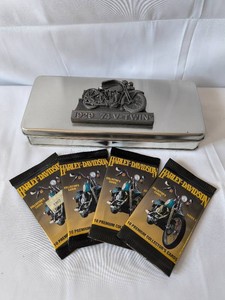 Vintage Harley Davidson tin with four packs of Harley trading cards
