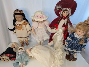 Collection of vintage and modern collectible porcelain dolls