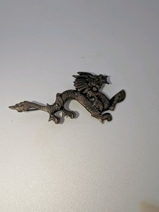 Vintage pewter dragon brooch
