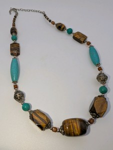 Bohemian-style statement necklace, polished tigers eye and turquoise gemstone beads