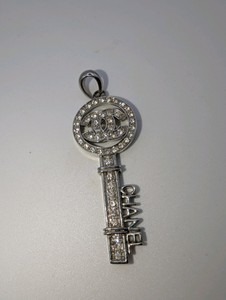 Chanel CC logo rhinestone key pendant, unauthenticated