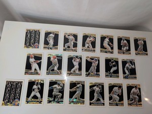 Collection of 1993 Topps Baseball Black Gold insert cards and uncut winnerredemption panel sheets, featuring prominent players like Barry Larkin, Barry Bonds, and Frank Thomas