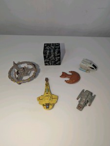 1990s Galoob Star Trek Micro Machines, including the Ferengi Marauder, Borg Cube, and Deep Space Nine station