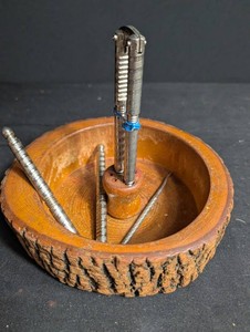 Wooden Bowl With Metal Rods