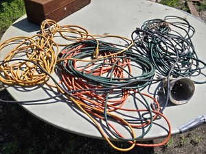 Extension cords in various states of repair