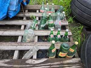 Old Glass Soda Bottles of Various Brands