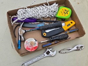 Lot of Hand Tools including Claw Hammer, Tape Measure, Screwdrivers, and Adjustable Wrench