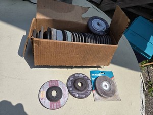 Box of Grinding Discs and Flap Discs Including Makita, UltraCut, and Others