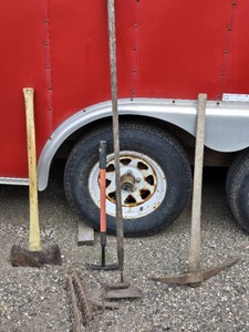 Lot of Hand Tools Including Axe, Pickaxe, Hoe, and Rakes