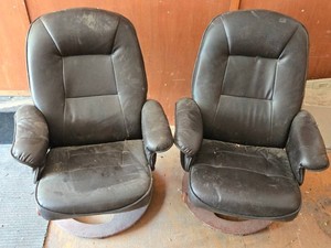 Two Black Leather Reclining Chairs with Swivel Base