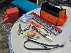 Hand Tools and Garage Accessories including Level, Timer, and Utility Items