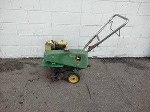 Vintage John Deere 216 walk-behind rototiller,