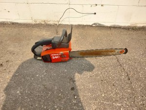 Homelite 240 chainsaw, typically featuring a 39.3cc engine.
