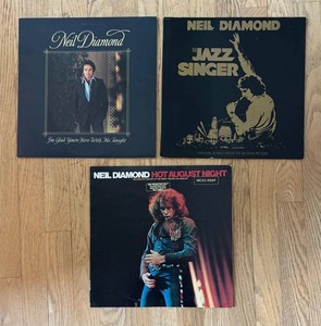LR - Vintage Neil Diamond Record Albums Trio including Hot August Night, the Jazz Singer and Im Glad Youre Here
