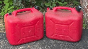 G - Two 6 Gallon Gas Cans
