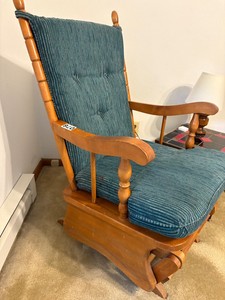 Wooden rocker with seat padding