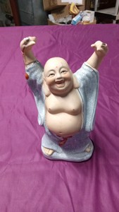 Vintage porcelain buddah